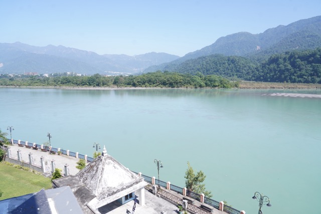 View of the Ganga river and surrounding hills in Rishikesh